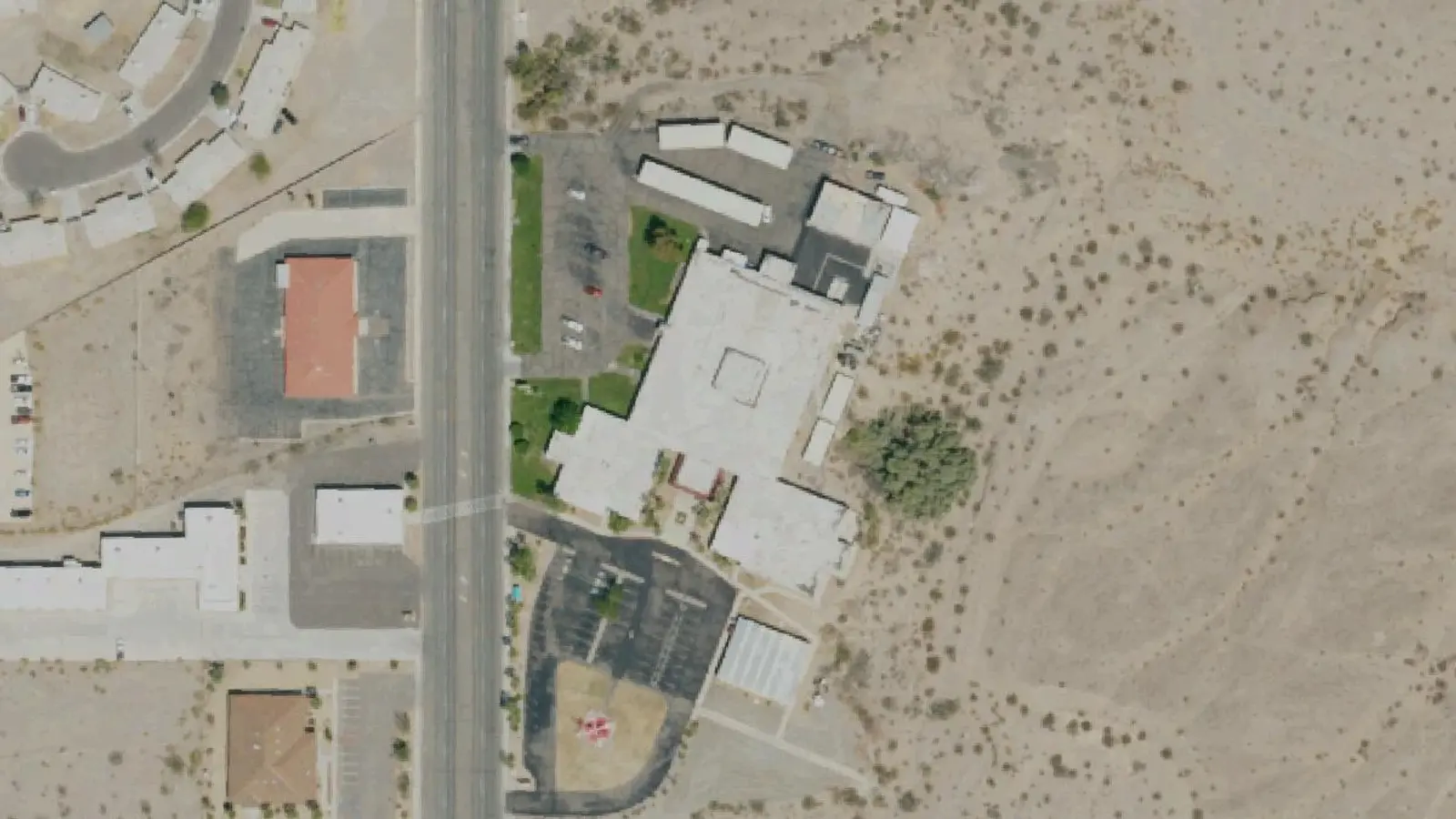 Aerial view of Colorado River Medical Center in Needles, CA campus and surroundings; USDA NAIP imagery, 2022.
