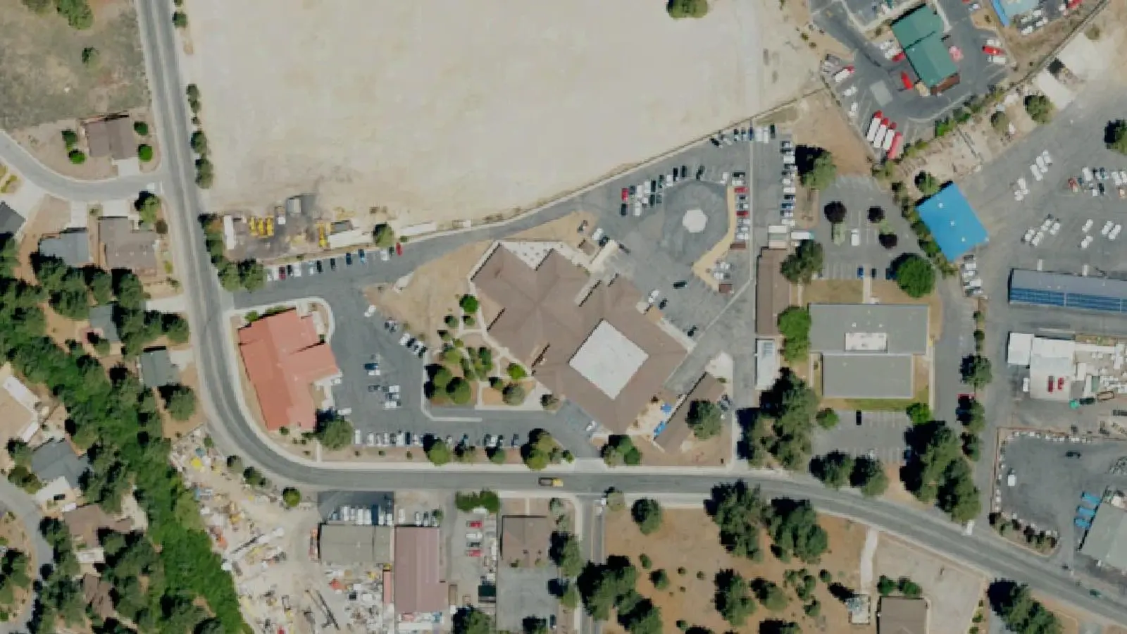 Aerial view of Bear Valley Community Hospital in Big Bear Lake, CA campus and surroundings; USDA NAIP imagery, 2022.